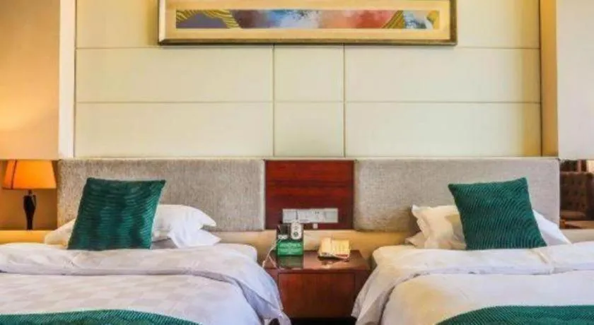 Bed in Fortune Hotel Longyan