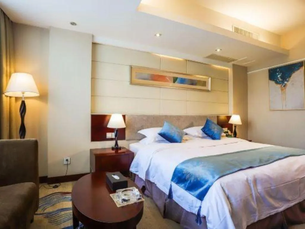 Bed in Fortune Hotel Longyan