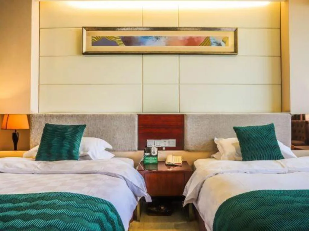 Bed in Fortune Hotel Longyan