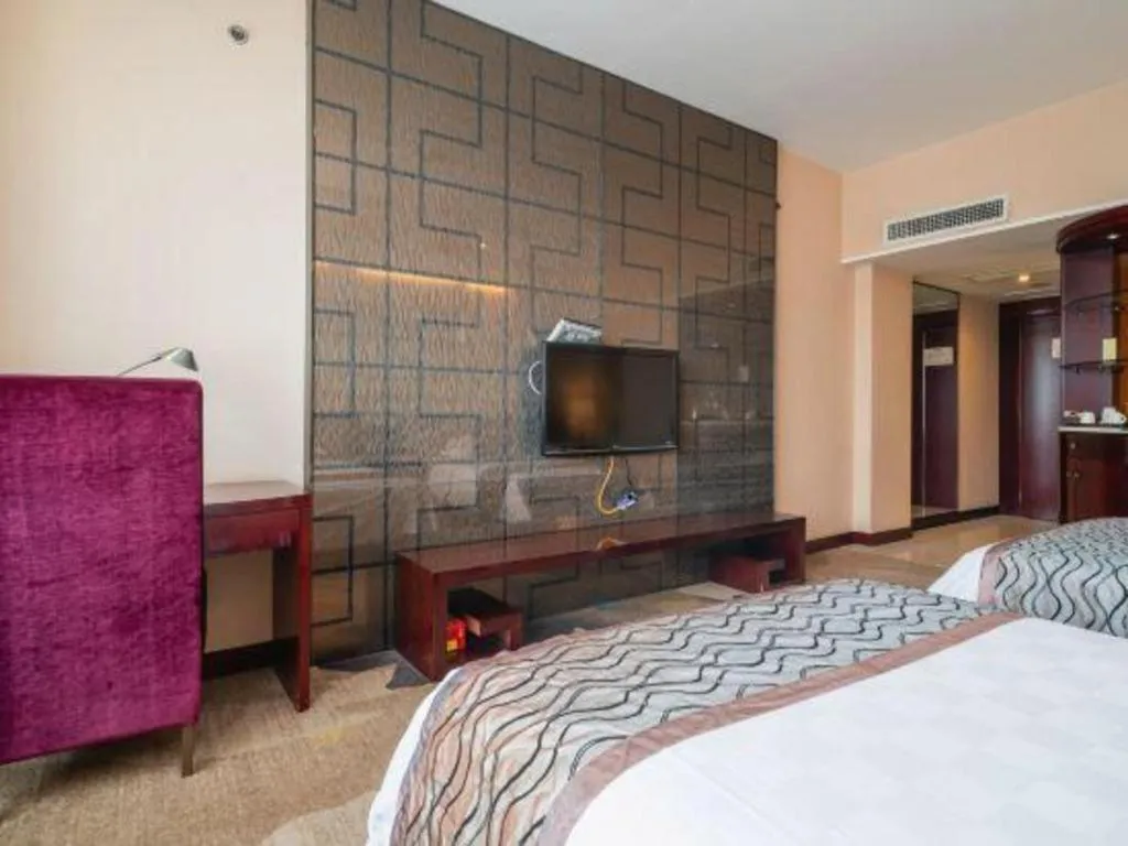 Bed in Fortune Hotel Longyan