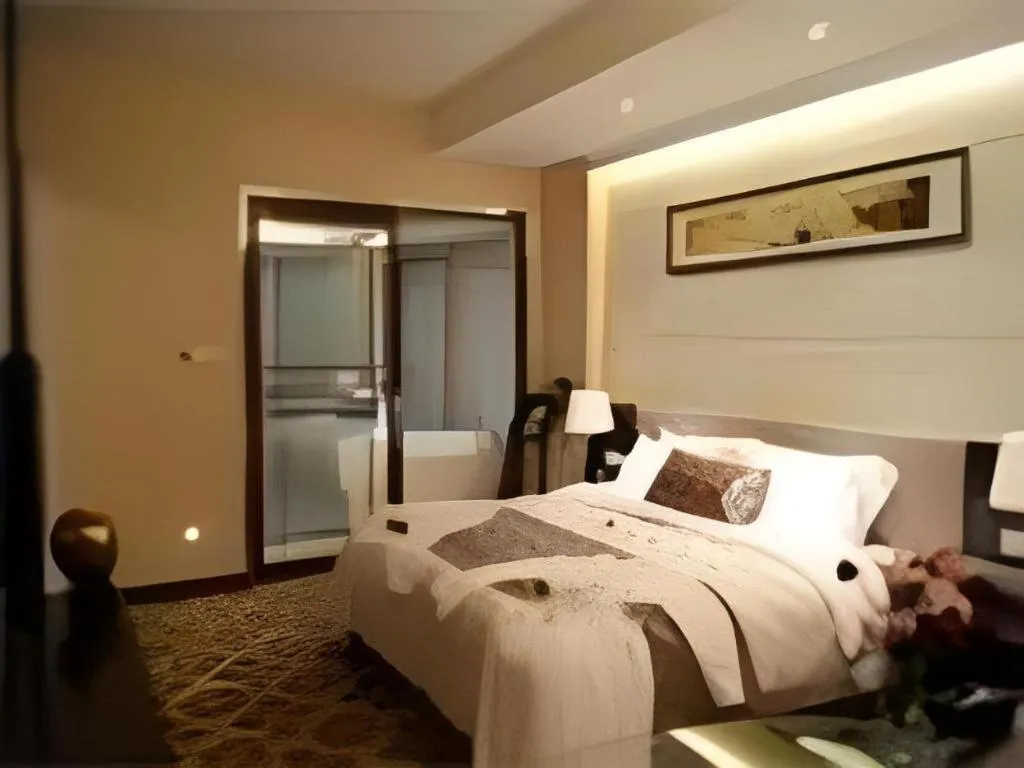 Bed in Fortune Hotel Longyan