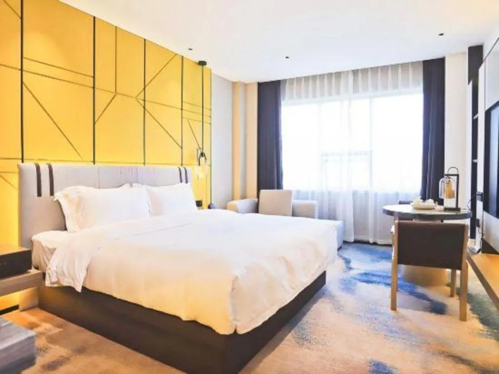 Bed in Fortune Hotel Longyan