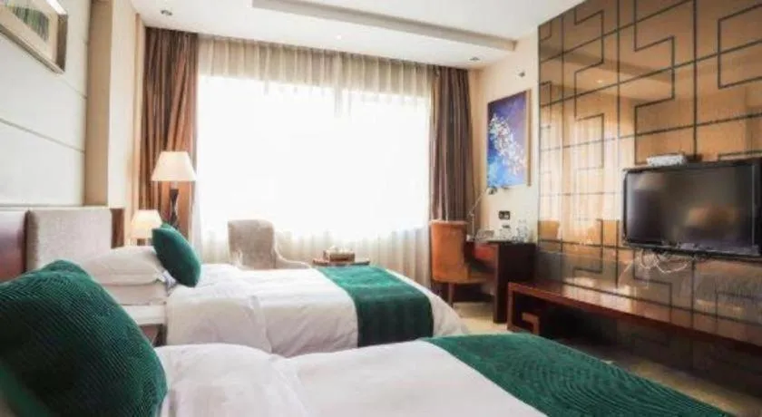 Bed in Fortune Hotel Longyan