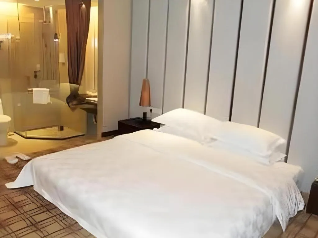 Bed in Fortune Hotel Longyan
