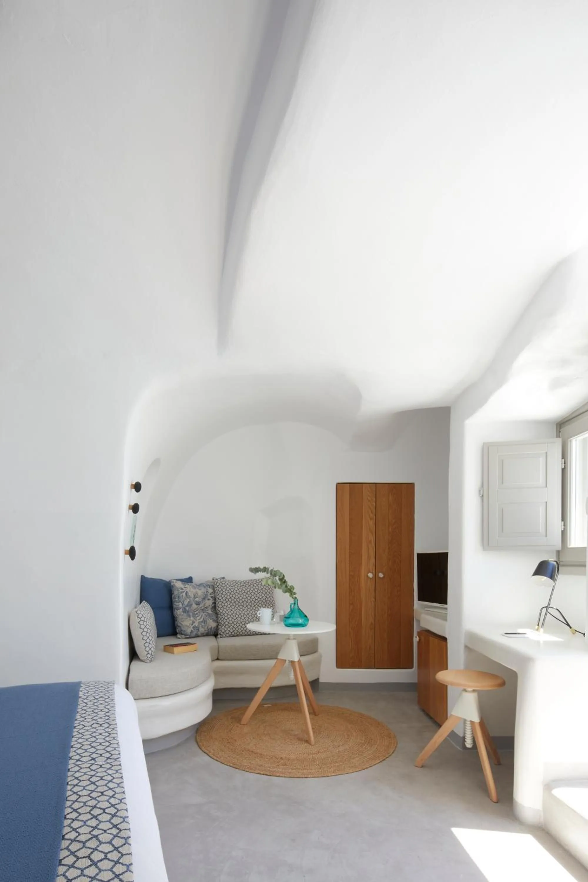 Seating area, Bed in Filotera Suites