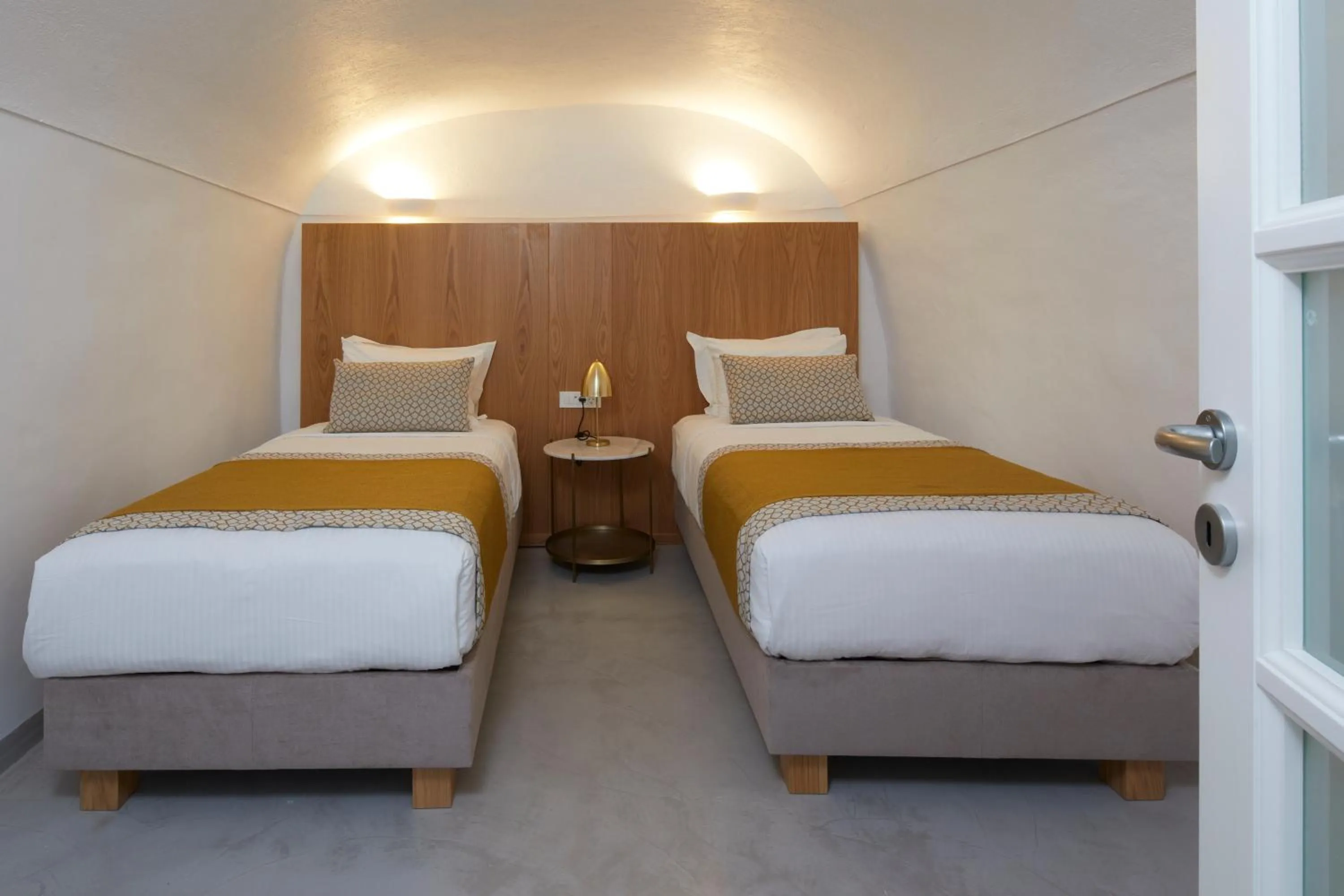 Bed in Filotera Suites