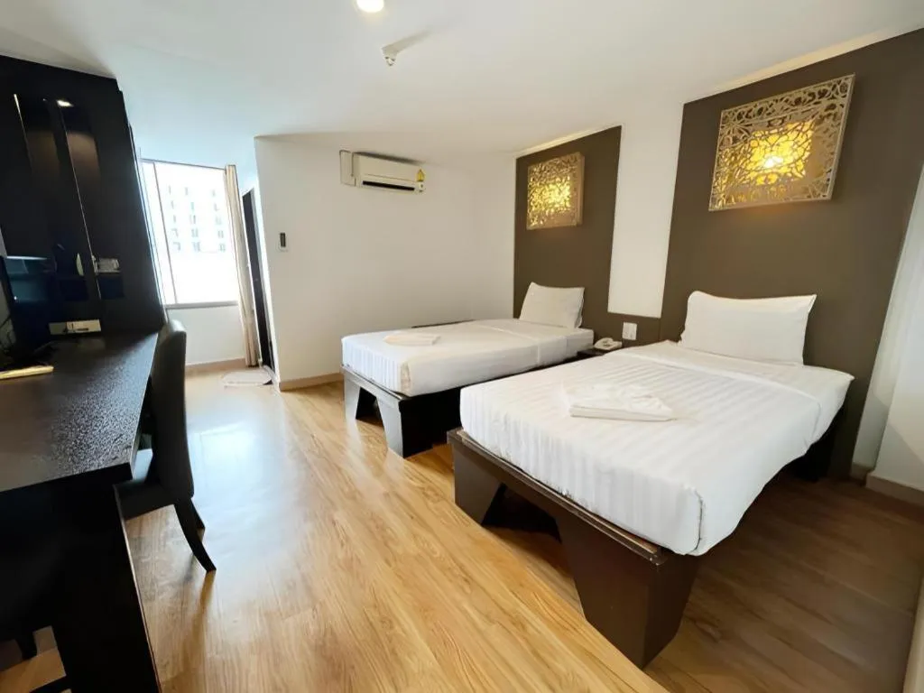 Bed in Laemchabang City Hotel