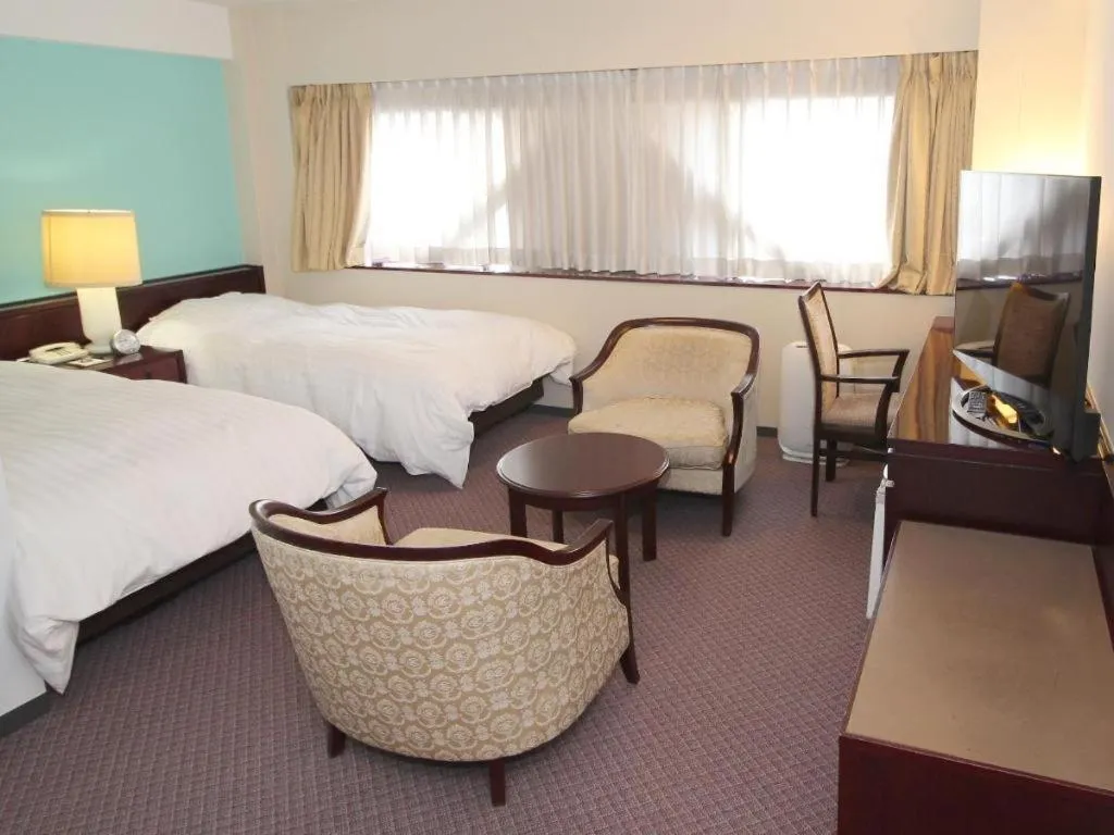 Bed in Oita Century Hotel