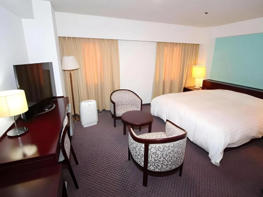 Bed in Oita Century Hotel