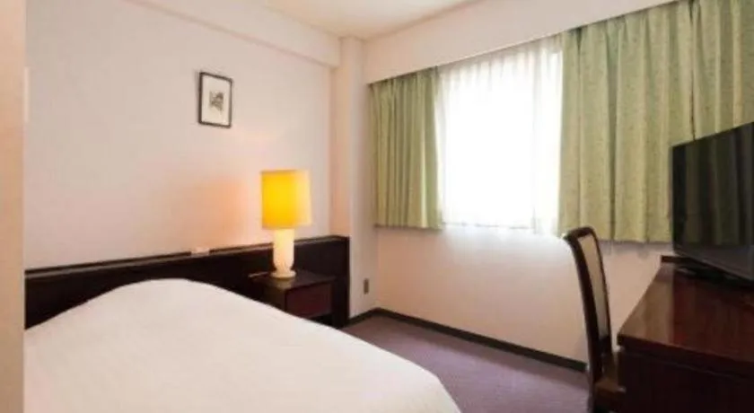 Bed in Oita Century Hotel