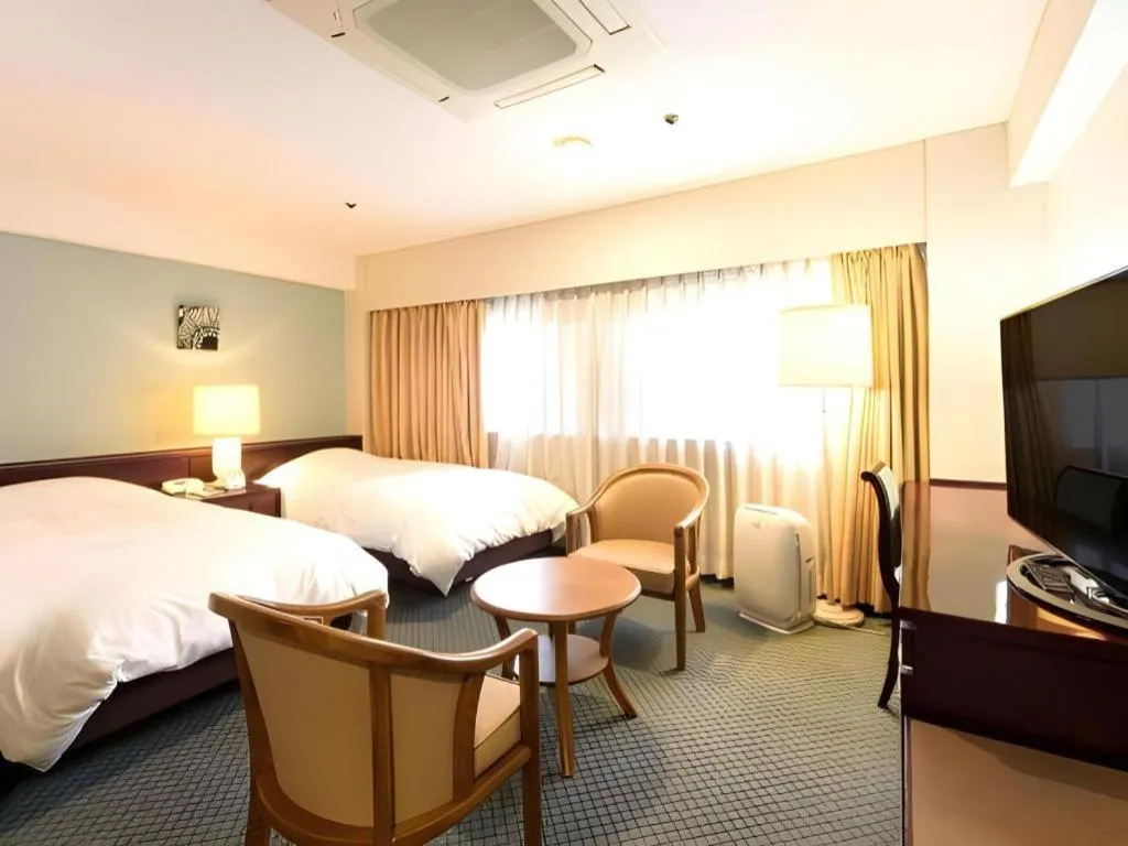 Bed in Oita Century Hotel