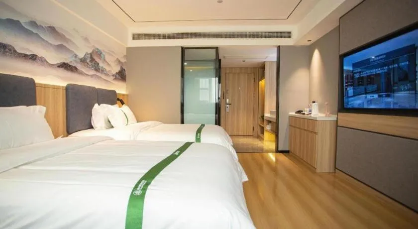 Bed in GreenTree Inn Bozhou Weiwu Road Hotel