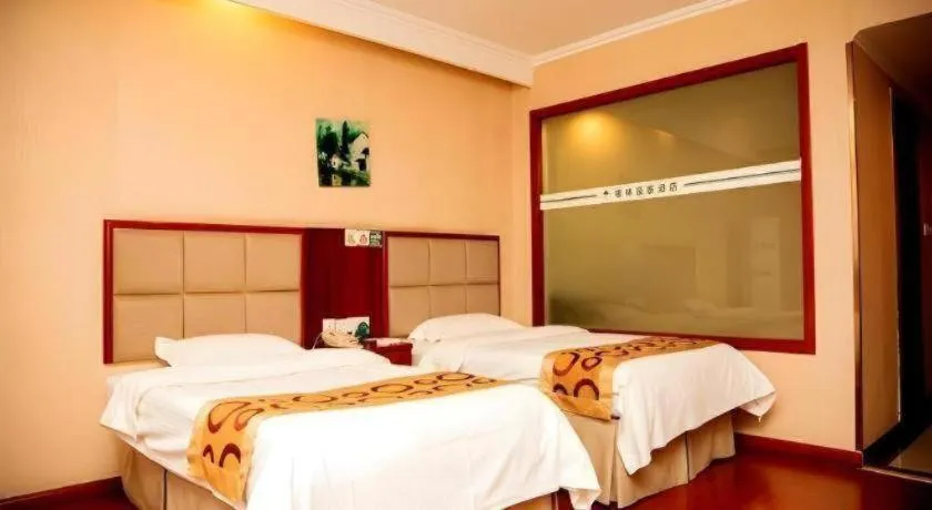 Bed in GreenTree Inn Bozhou Weiwu Road Hotel
