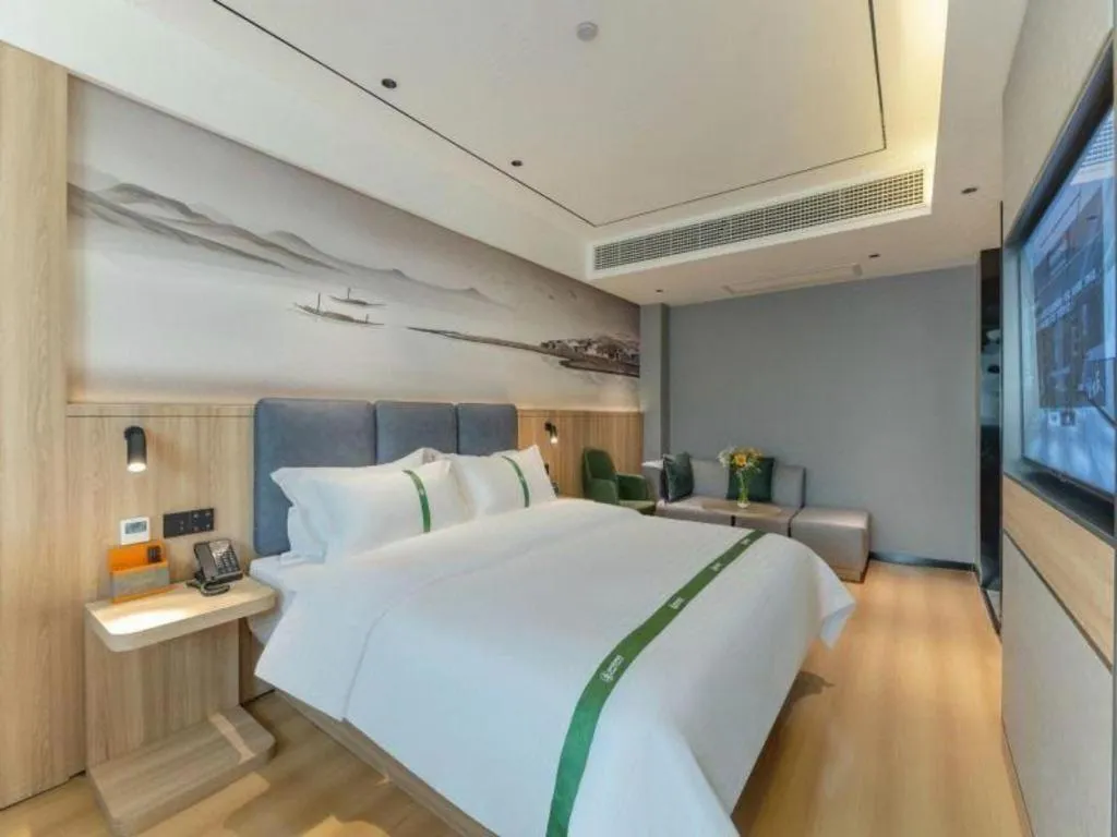 Bed in GreenTree Inn Bozhou Weiwu Road Hotel