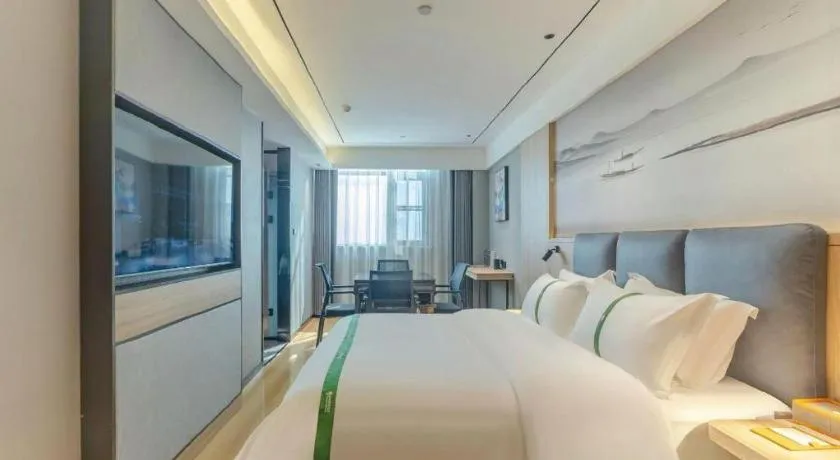 Bed in GreenTree Inn Bozhou Weiwu Road Hotel
