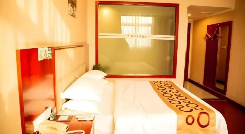 Bed in GreenTree Inn Bozhou Weiwu Road Hotel