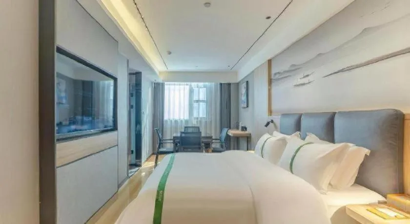 Bed in GreenTree Inn Bozhou Weiwu Road Hotel