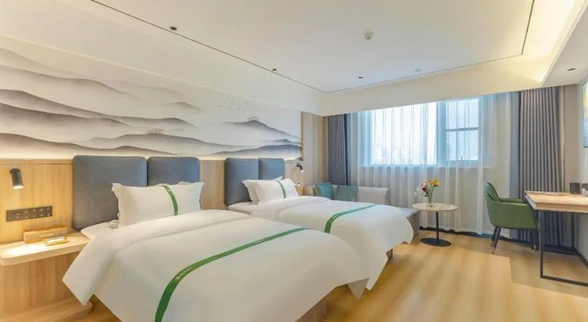 Bed in GreenTree Inn Bozhou Weiwu Road Hotel
