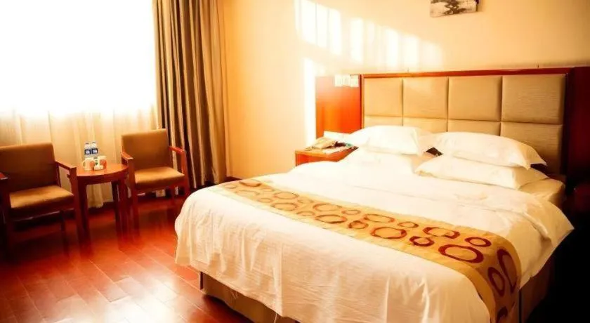 Bed in GreenTree Inn Bozhou Weiwu Road Hotel