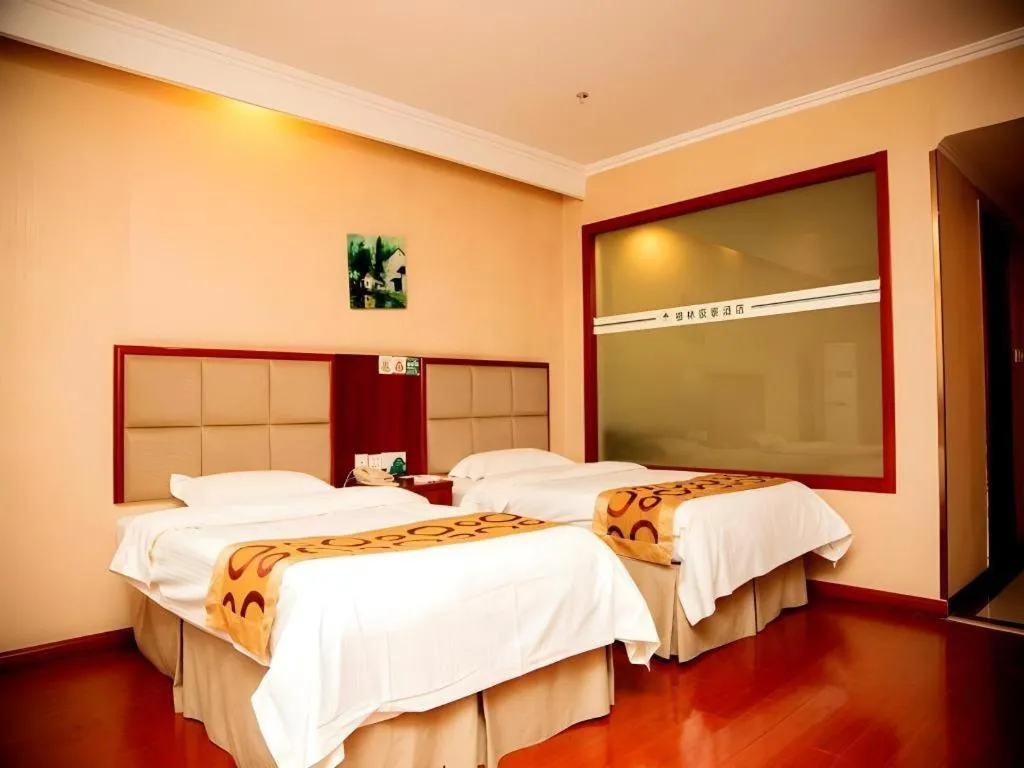 Bed in GreenTree Inn Bozhou Weiwu Road Hotel