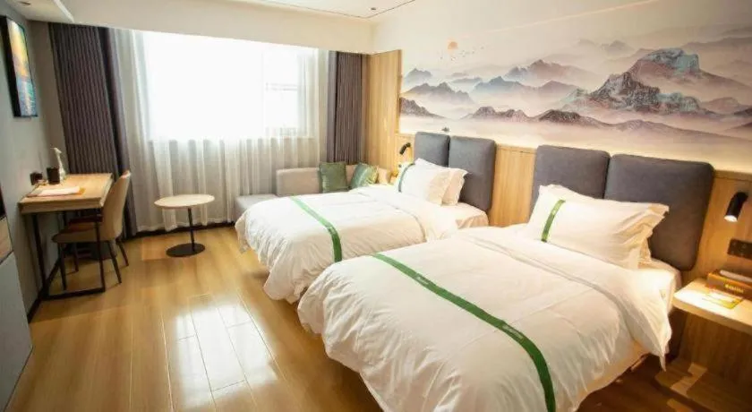 Bed in GreenTree Inn Bozhou Weiwu Road Hotel