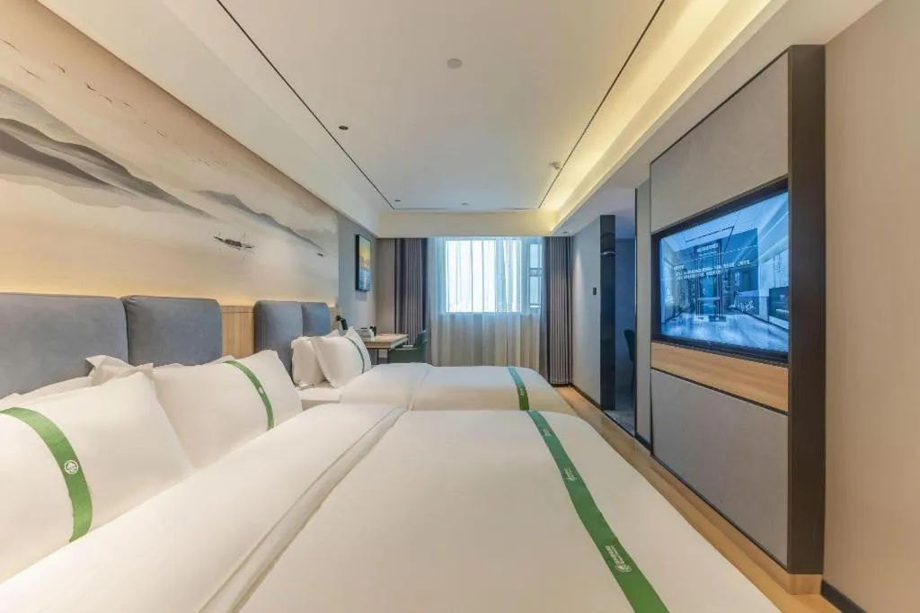 Bed in GreenTree Inn Bozhou Weiwu Road Hotel