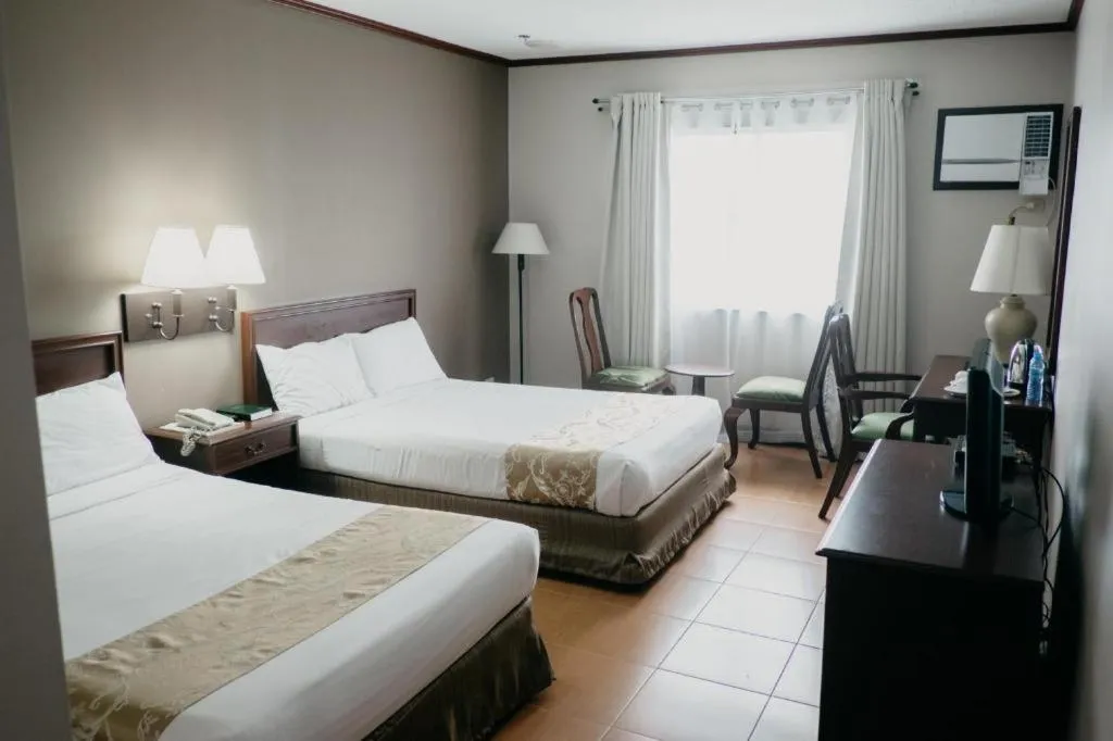 Bed in East Asia Royale Hotel