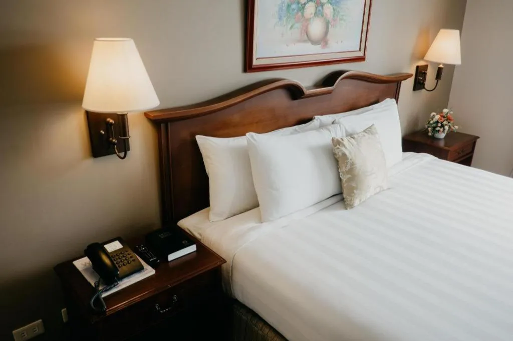 Bed in East Asia Royale Hotel