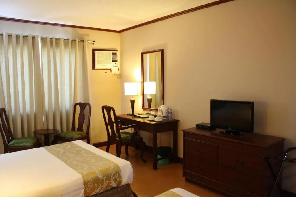 Bed in East Asia Royale Hotel