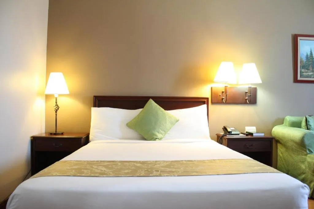 Bed in East Asia Royale Hotel