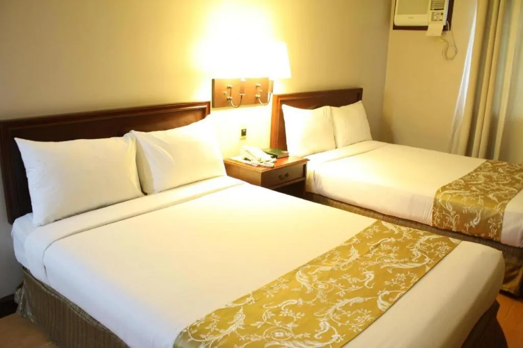 Bed in East Asia Royale Hotel