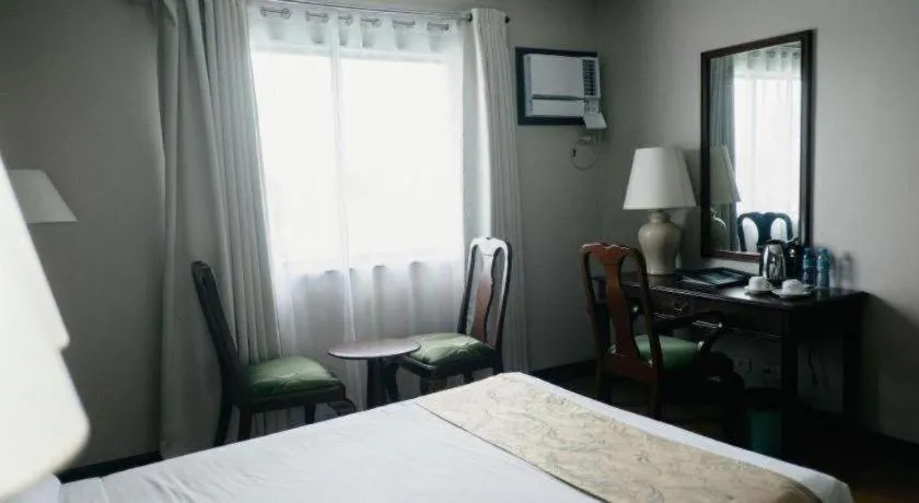 Bed in East Asia Royale Hotel