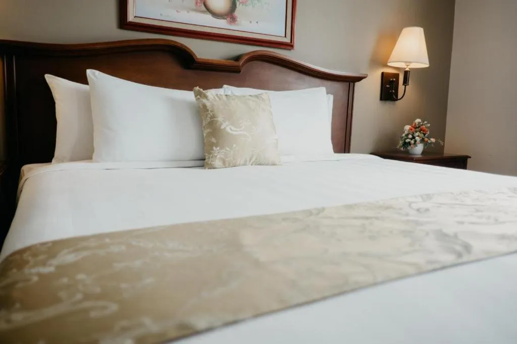 Bed in East Asia Royale Hotel