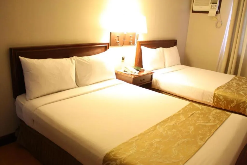 Bed in East Asia Royale Hotel