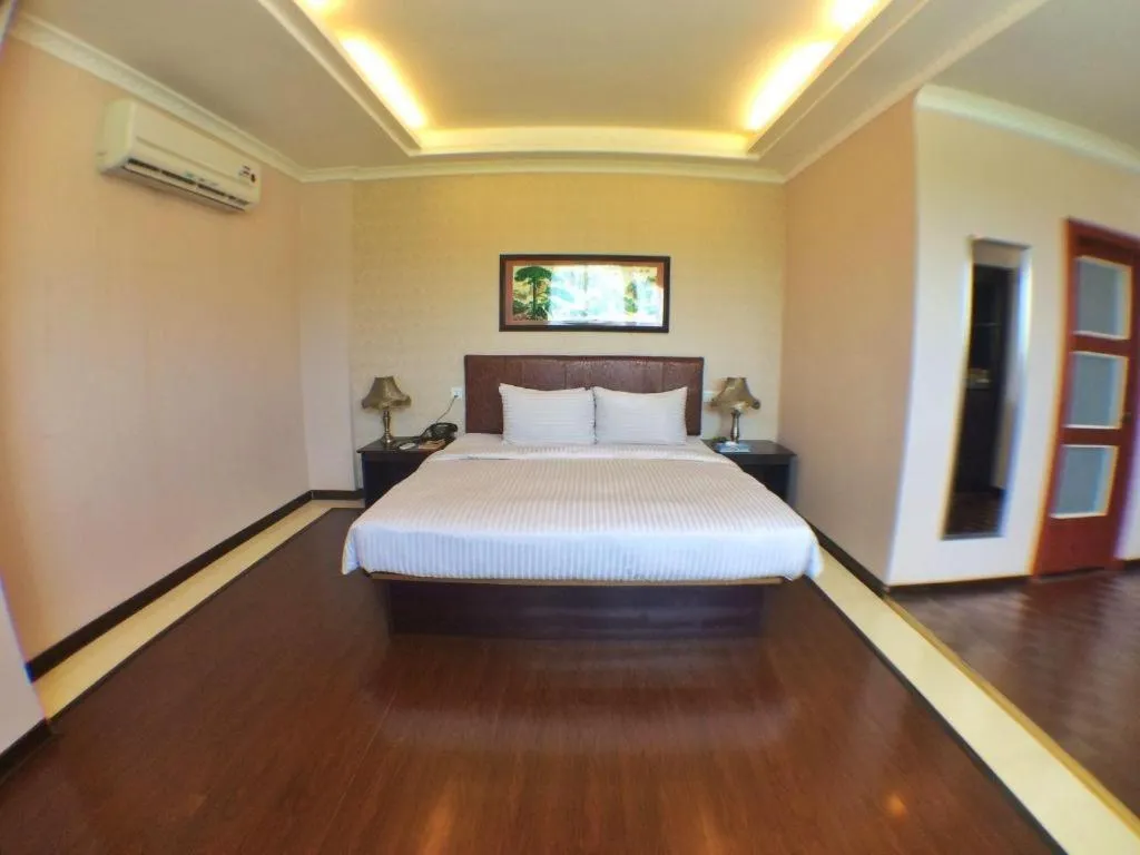 Bed in Grand Hoyah Hotel