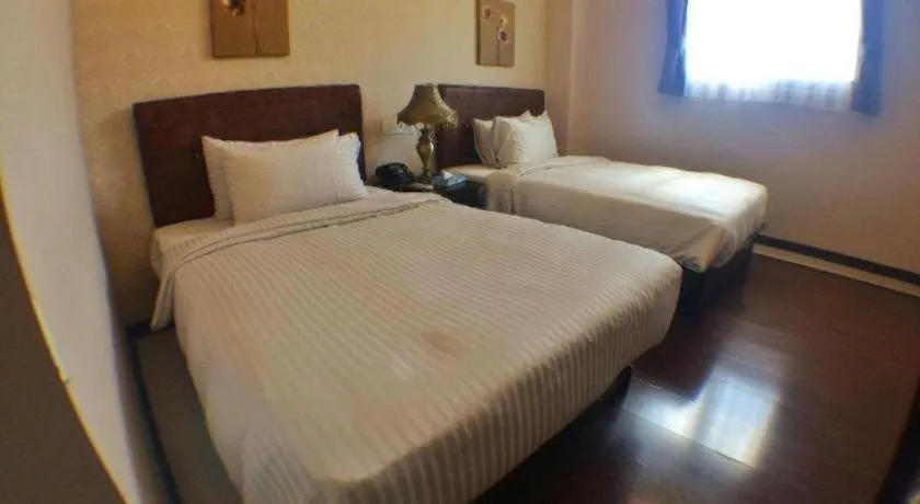 Bed in Grand Hoyah Hotel