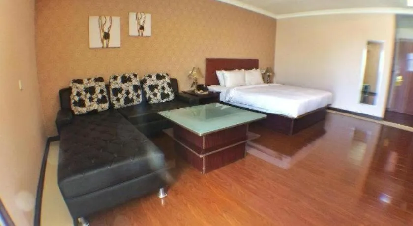 Bed in Grand Hoyah Hotel