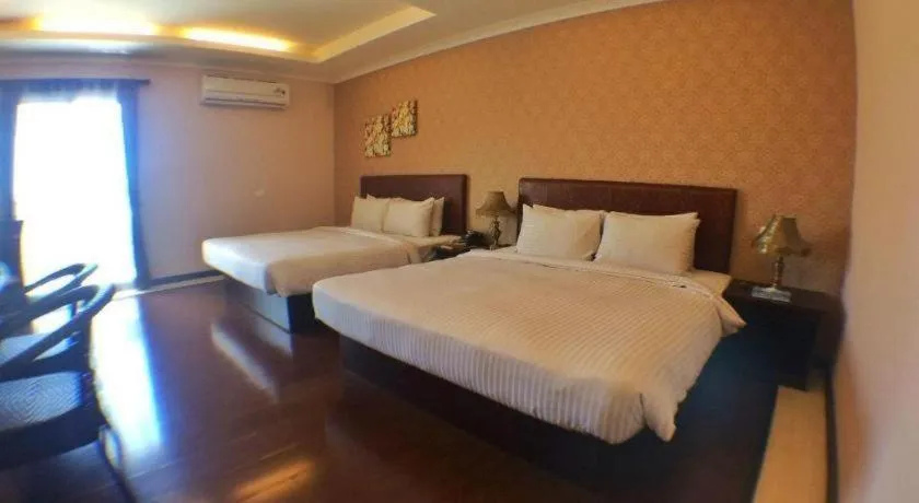 Bed in Grand Hoyah Hotel