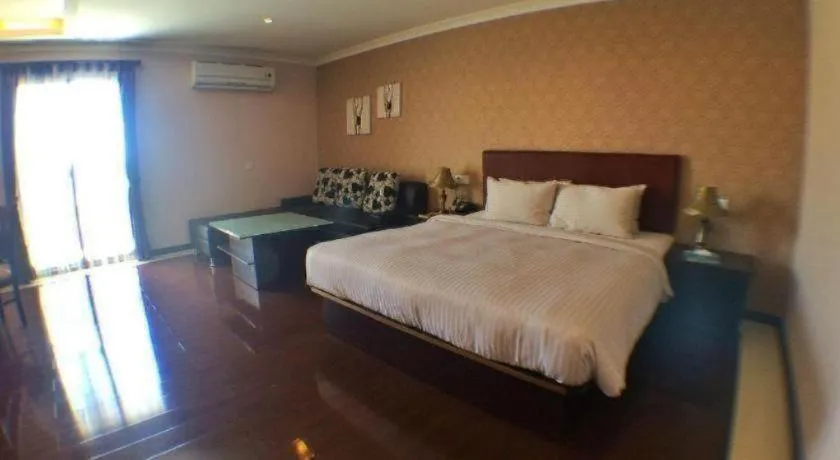 Bed in Grand Hoyah Hotel