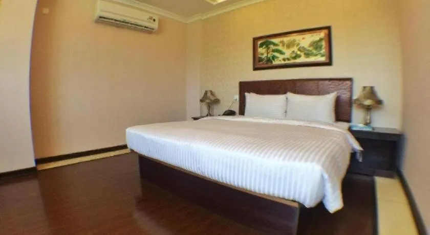 Bed in Grand Hoyah Hotel