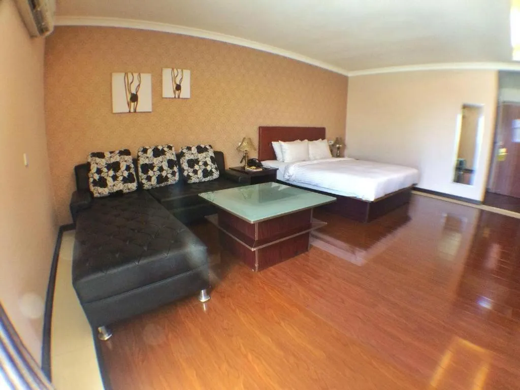 Bed in Grand Hoyah Hotel