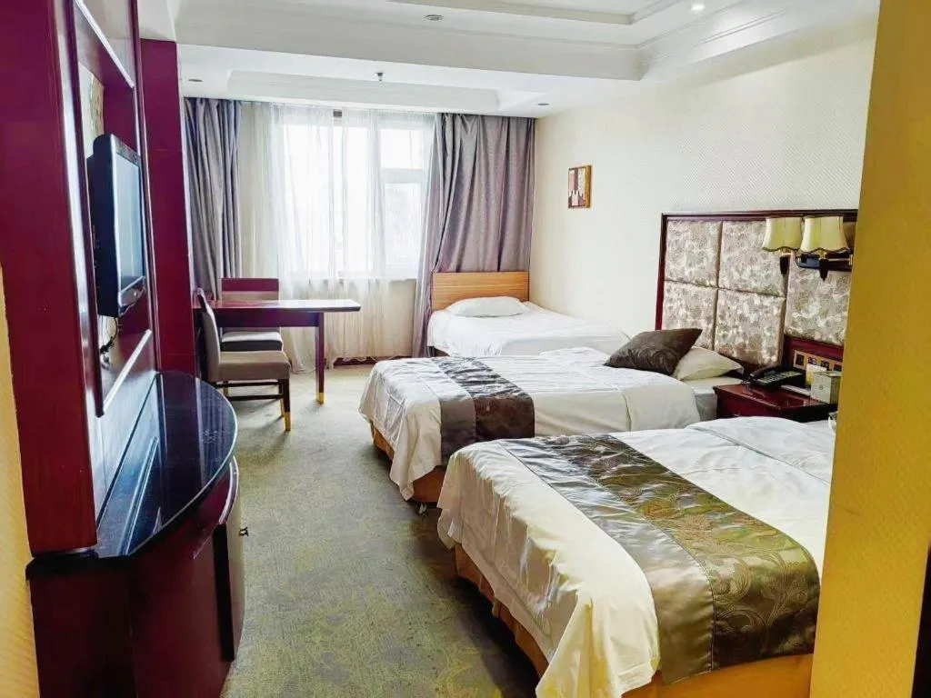 Bed in Changchun Global Hotel