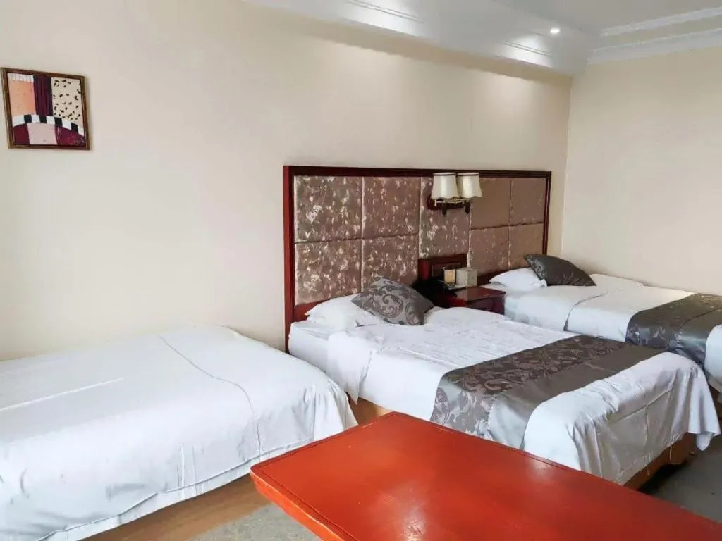 Bed in Changchun Global Hotel