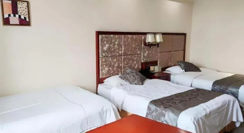 Bed in Changchun Global Hotel