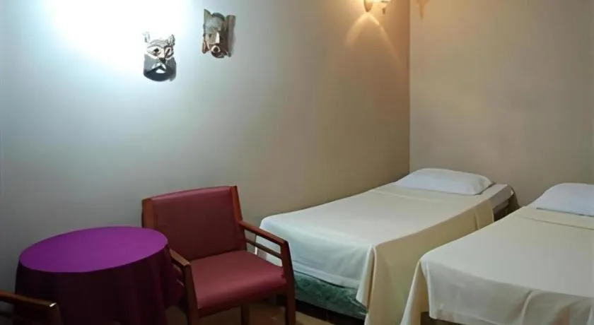 Bed in Alicia Hotel & Restaurant