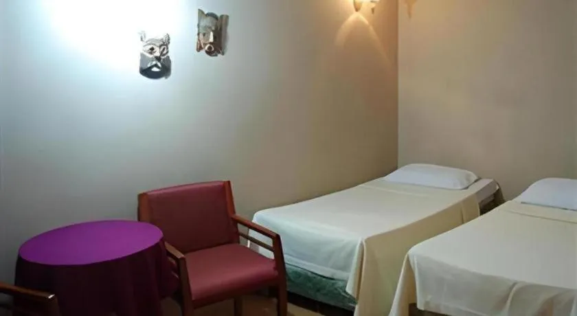 Bed in Alicia Hotel & Restaurant