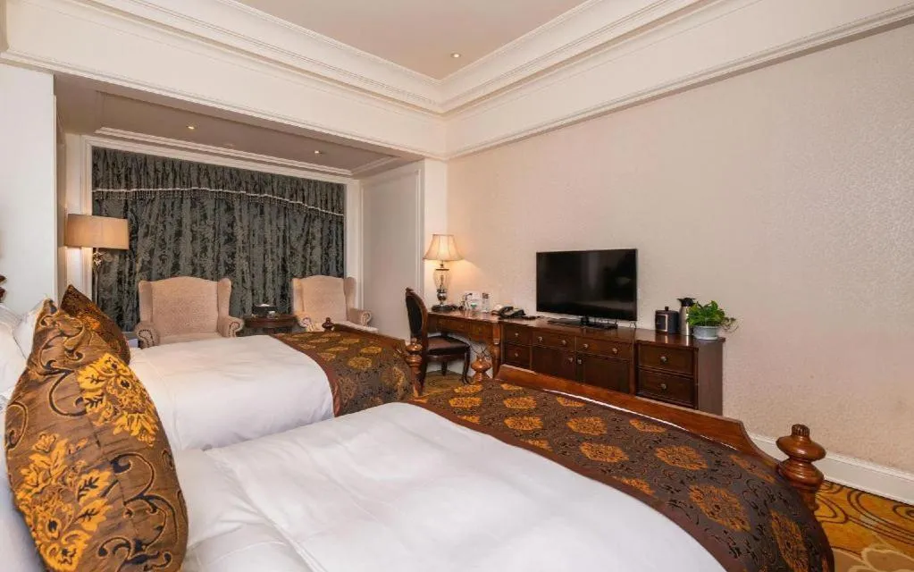 Bed in Zhengzhou Yiquan International Hotel