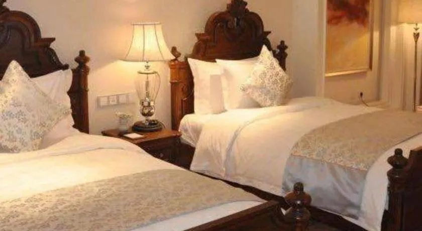 Bed in Zhengzhou Yiquan International Hotel