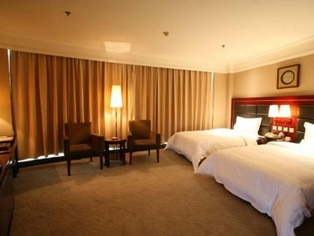 Bed in Jincheng Pacific Hotel