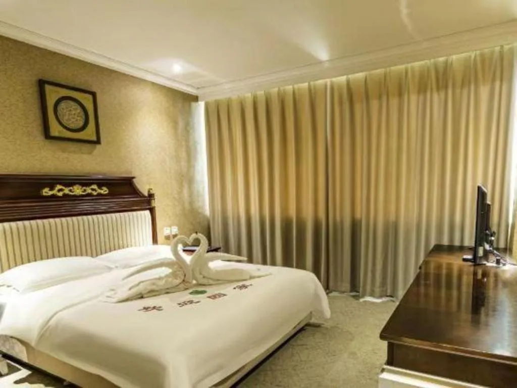 Bed in Jincheng Pacific Hotel
